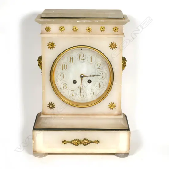A 19thC French white alabaster mantel clock