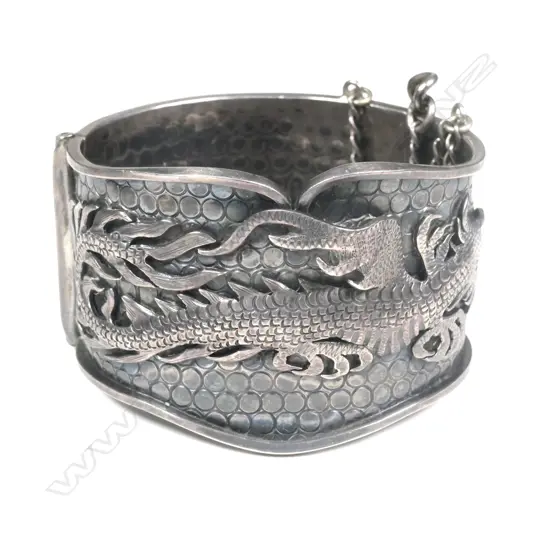 A vintage Tony Buller silver hinged bangle