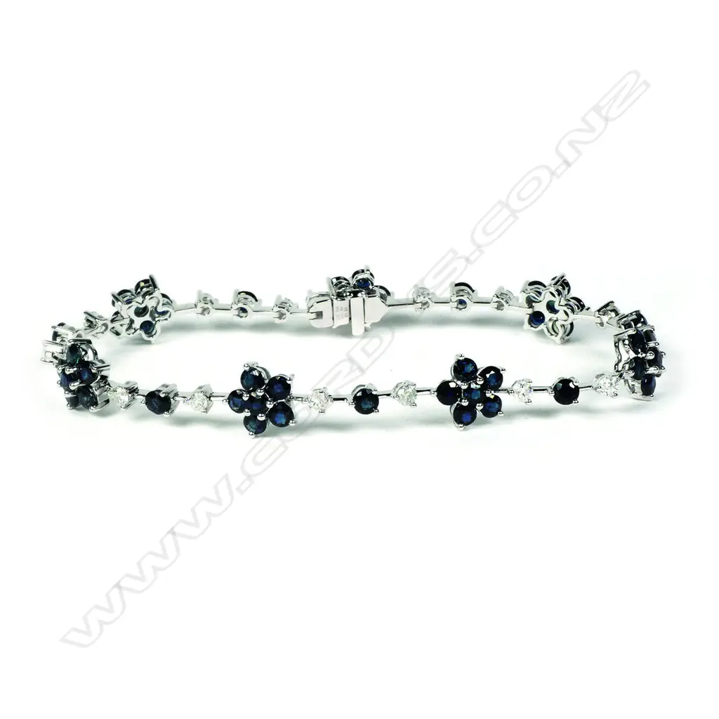 A 14ct white gold sapphire and diamond bracelet Image 1++