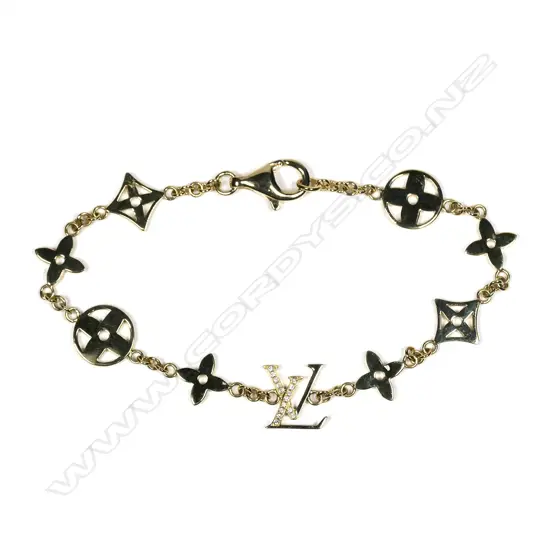An 18ct yellow gold and diamond set designer bracelet