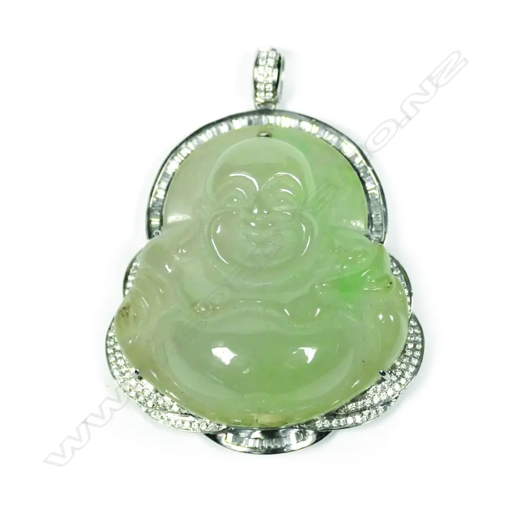 An 18ct white gold diamond and jadeite pendant Image 1++