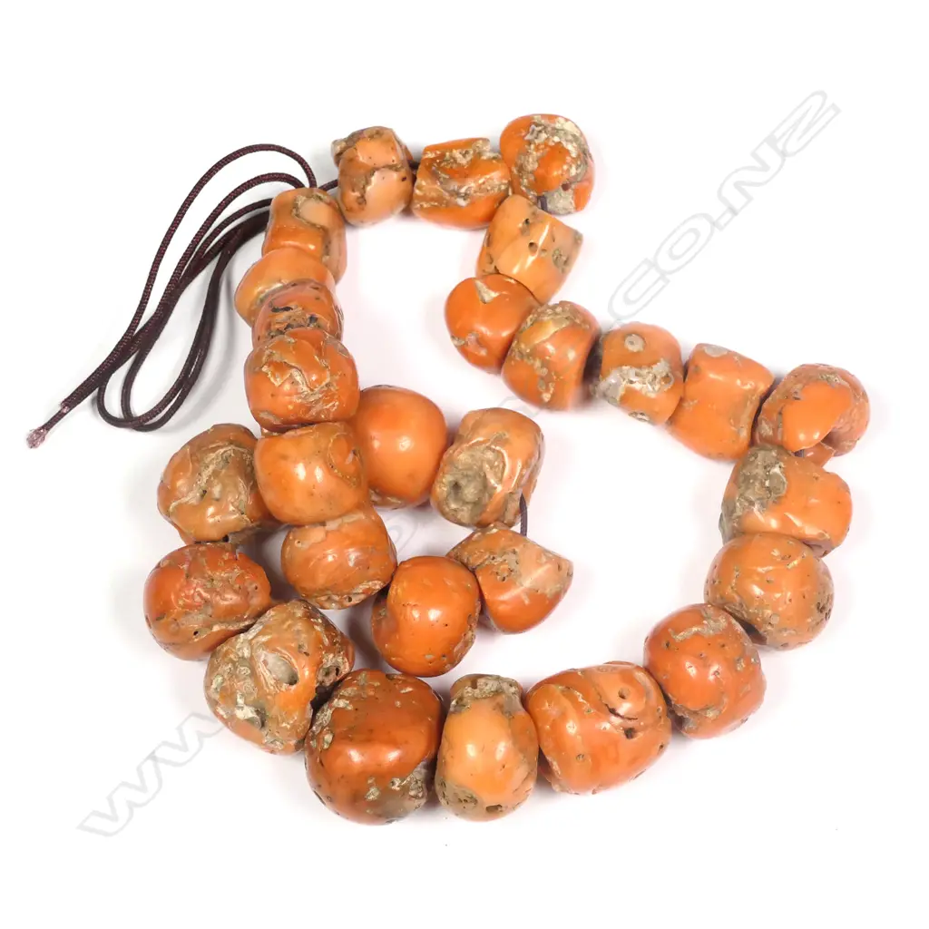 A vintage orange coral bead necklace Image 1++