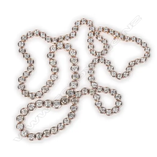 A 14ct rose gold diamond riviera necklace