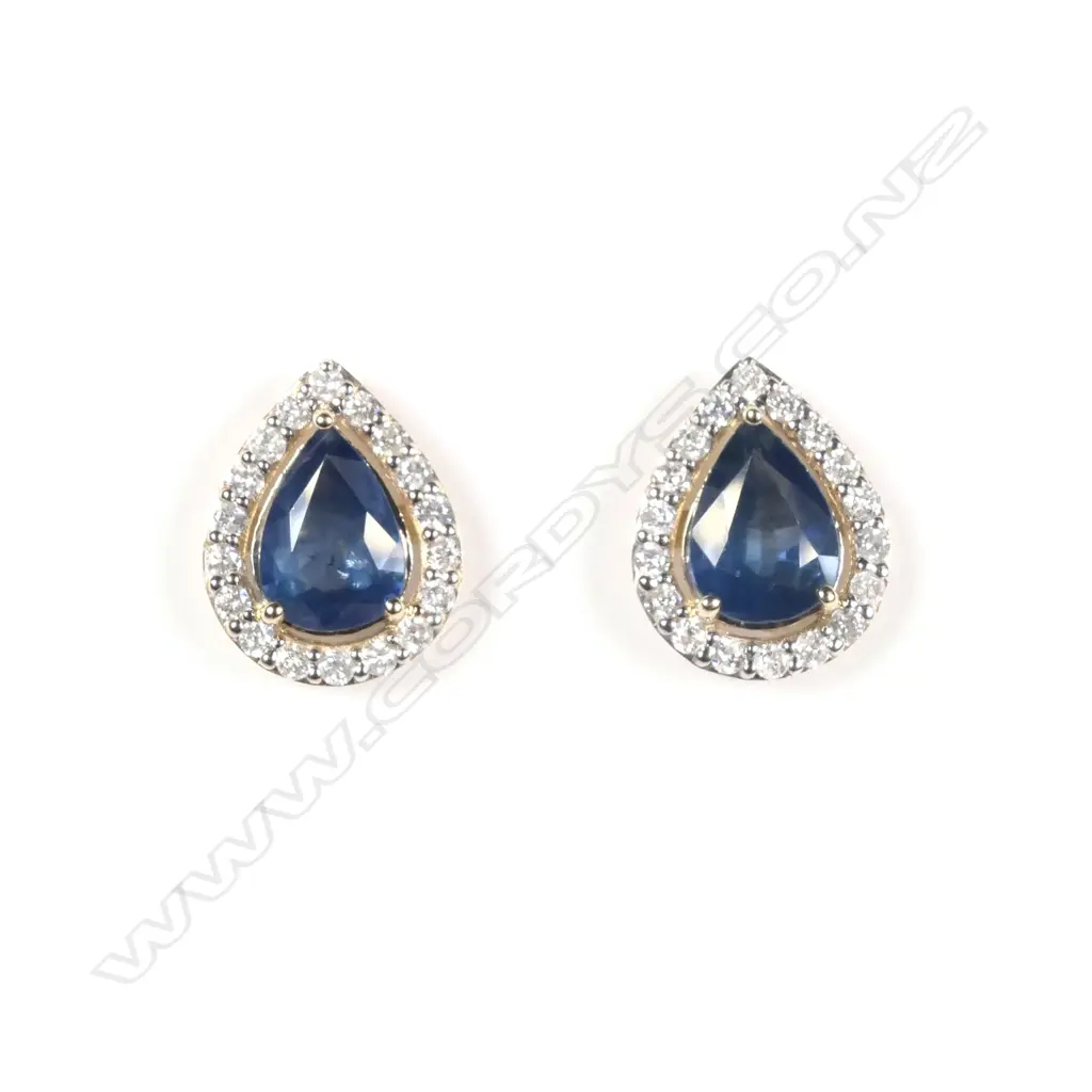 A pair of 14ct yellow gold sapphire and diamond stud earrings each earring set with a 1.00ct pear cut Image 1++