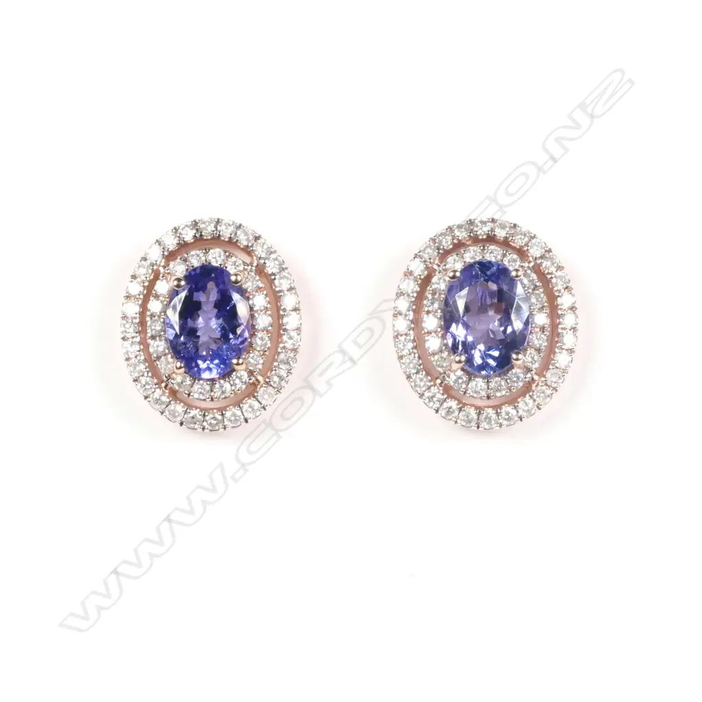 A pair of 14ct rose gold tanzanite and diamond double halo stud earrings Image 1++