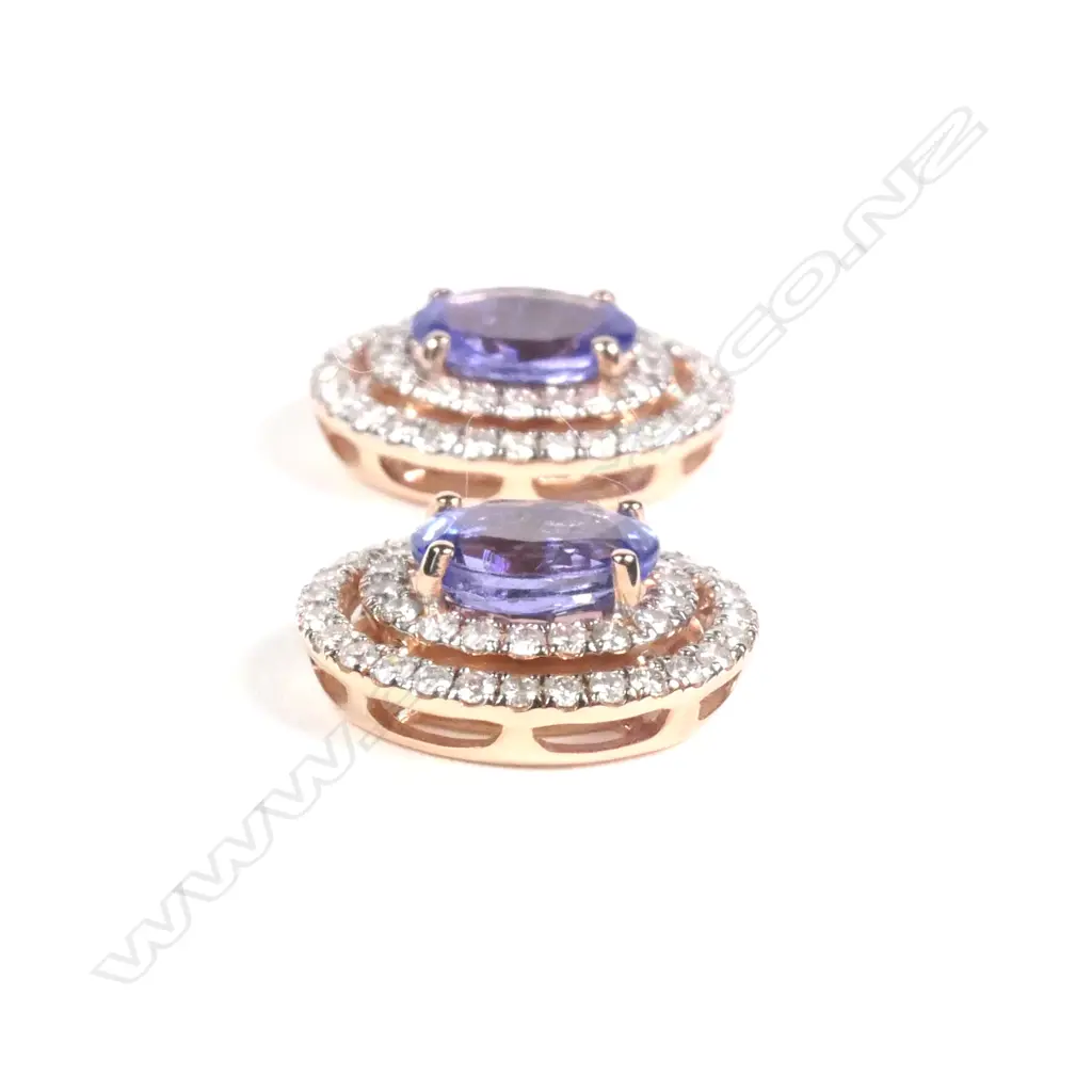 A pair of 14ct rose gold tanzanite and diamond double halo stud earrings Image 1++