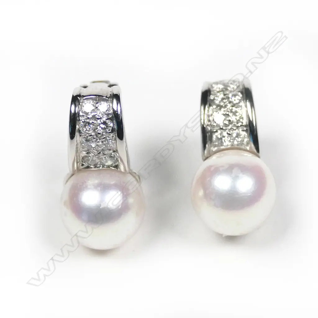 A pair of Bvlgari 18ct white gold diamond and pearl earrings Image 1++