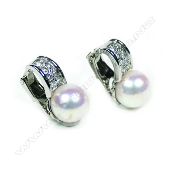 A pair of Bvlgari 18ct white gold diamond and pearl earrings
