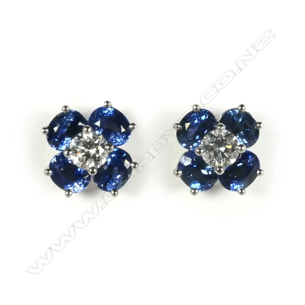 A pair of 18ct white gold sapphire and diamond earrings Image 1++