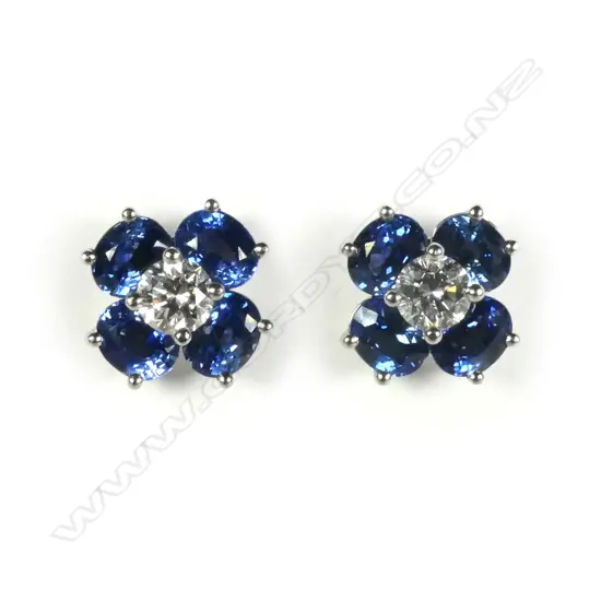 A pair of 18ct white gold sapphire and diamond earrings