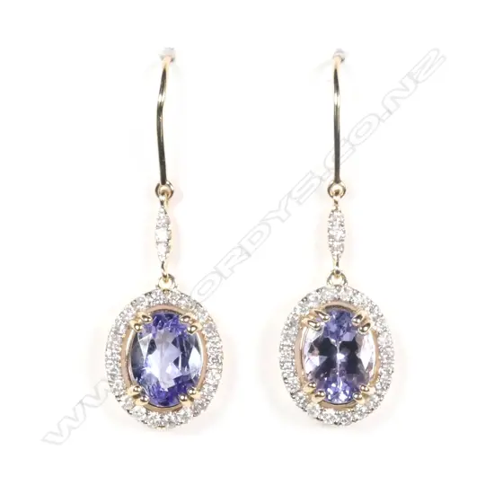 A pair of 14ct yellow gold tanzanite and diamond drop earrings