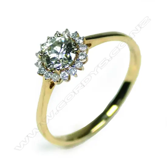 A 14ct yellow gold diamond halo ring