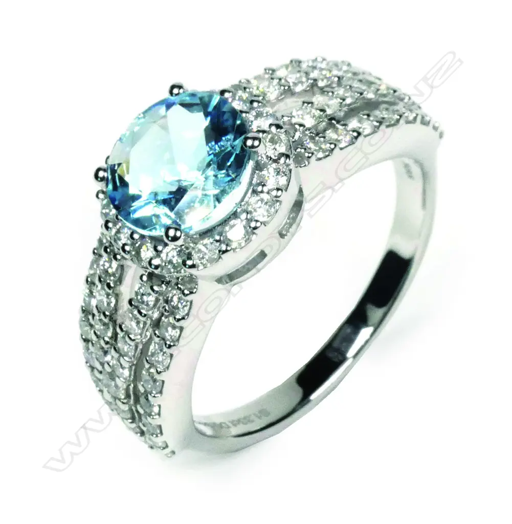 A 14ct white gold aquamarine and diamond ring Image 1++