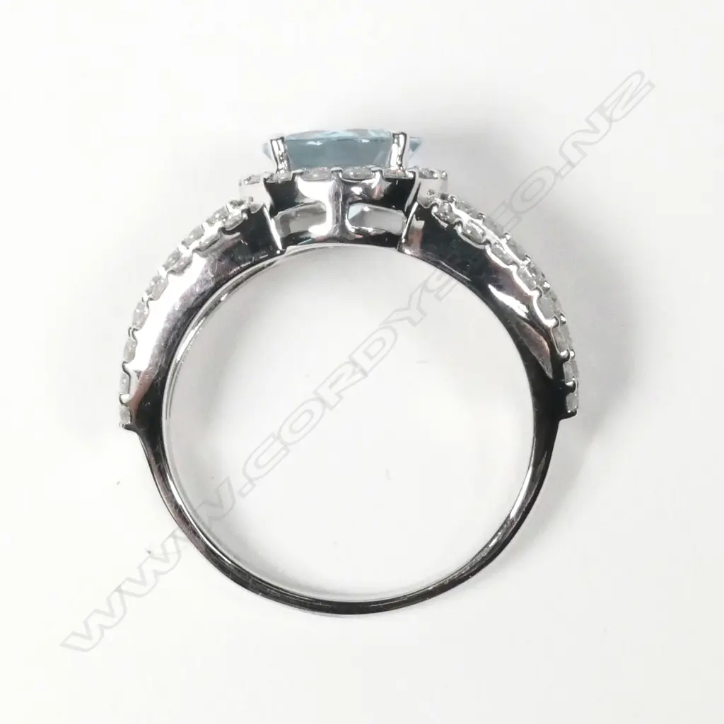 A 14ct white gold aquamarine and diamond ring Image 1++