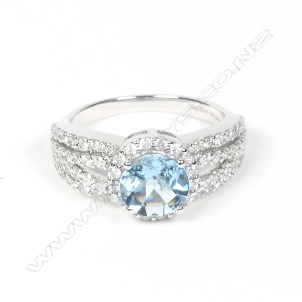 A 14ct white gold aquamarine and diamond ring Image 1++
