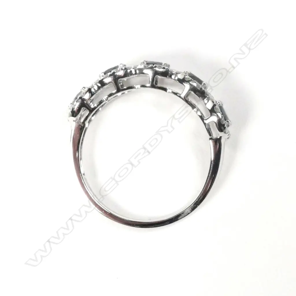 A 14ct white gold sapphire and diamond ring Image 1++