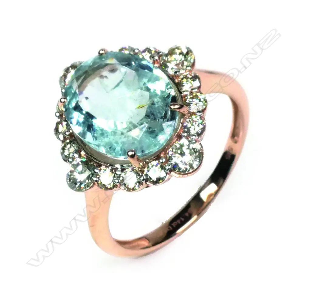 A 14ct rose gold aquamarine and diamond ring Image 1++
