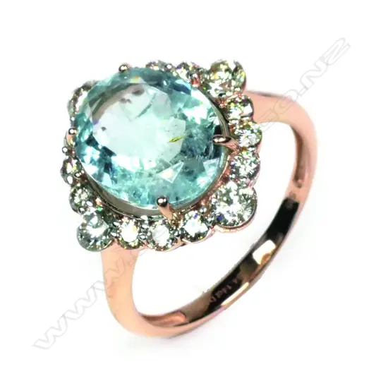 A 14ct rose gold aquamarine and diamond ring