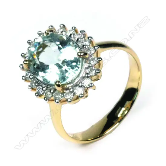A 14ct yellow gold aquamarine and diamond ring