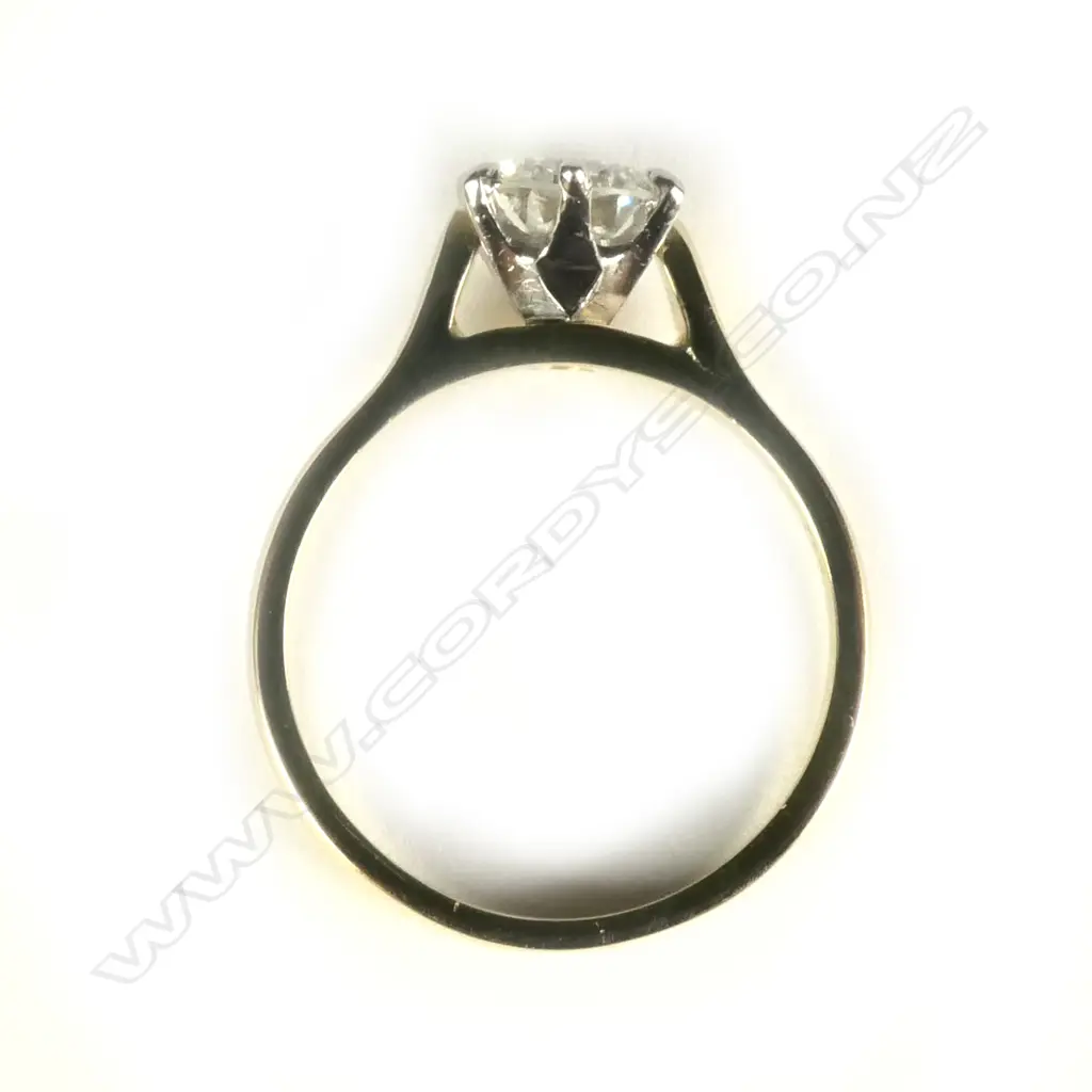 An estate 18ct gold and diamond solitaire ring Image 1++