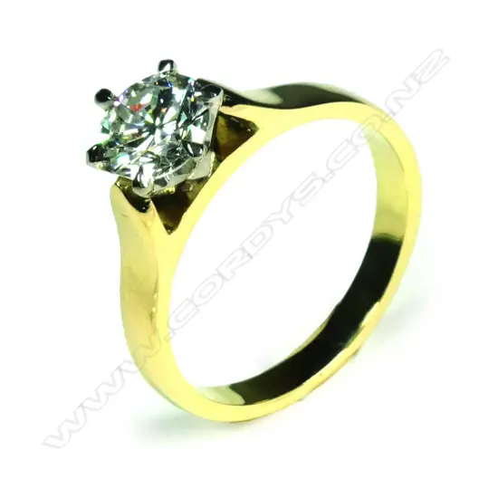 An estate 18ct gold and diamond solitaire ring