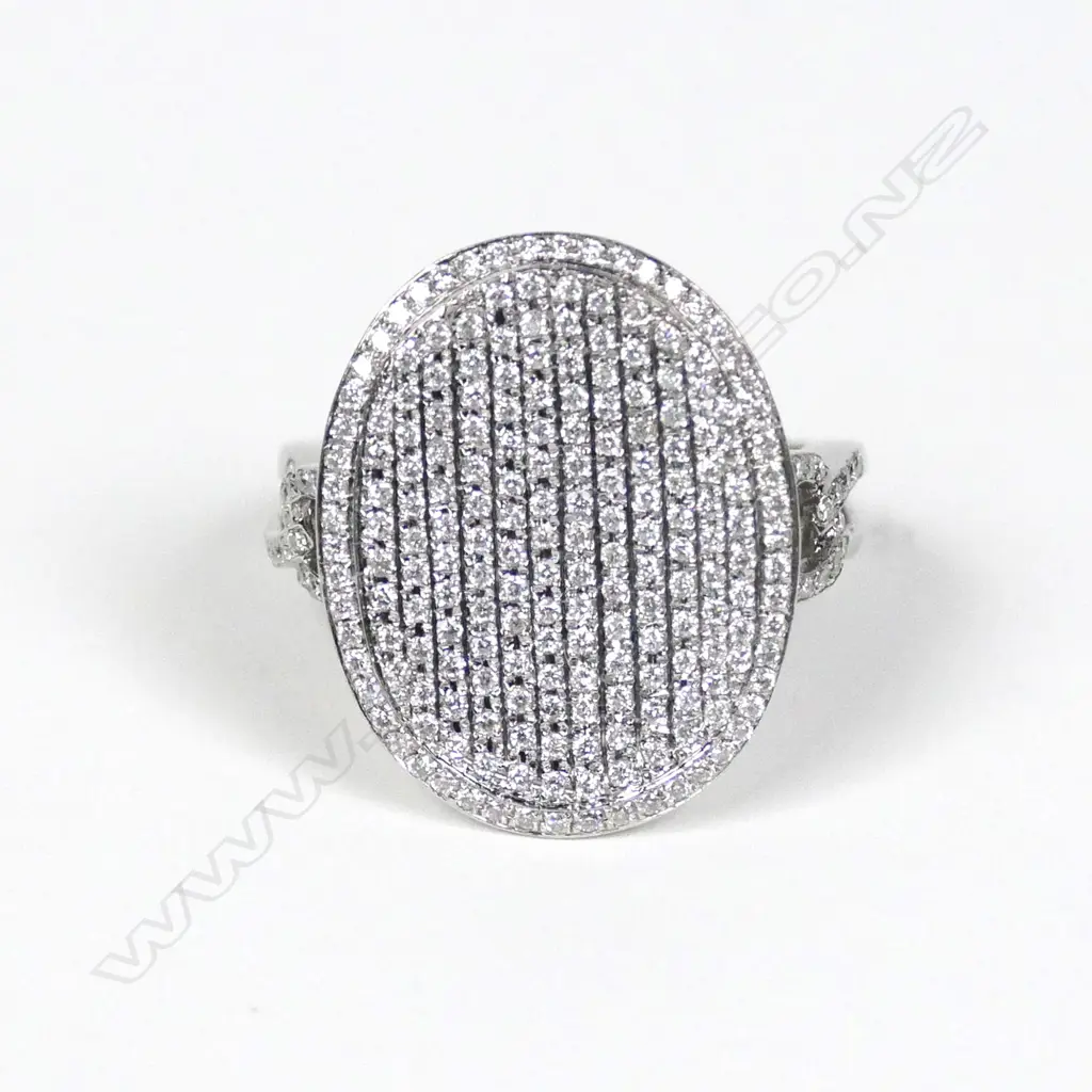 An 18ct white gold and diamond dress ring Image 1++
