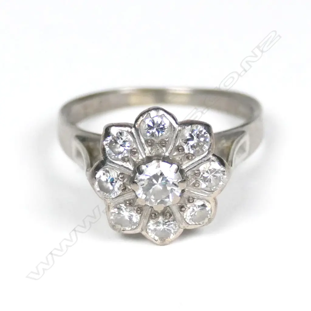 A vintage 18ct white gold and diamond cluster ring Image 1++