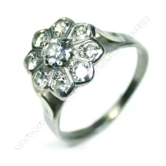 A vintage 18ct white gold and diamond cluster ring