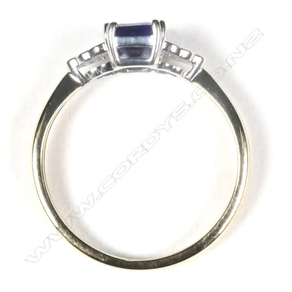 A 9ct yellow gold tanzanite and diamond ring Image 1++