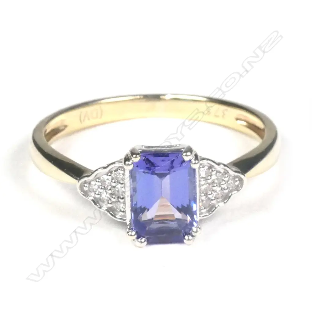 A 9ct yellow gold tanzanite and diamond ring Image 1++