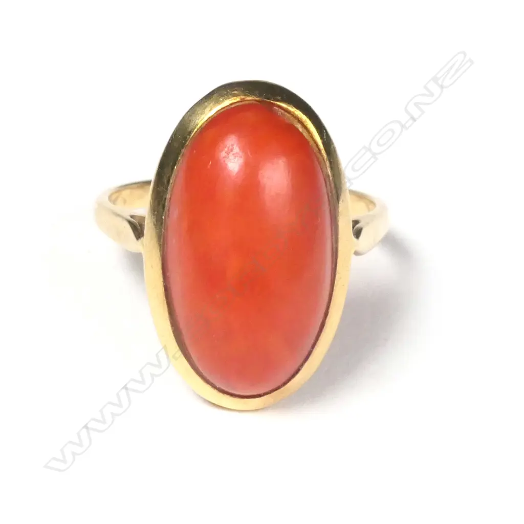 An 18ct. yellow gold and red coral dress ring Image 1++