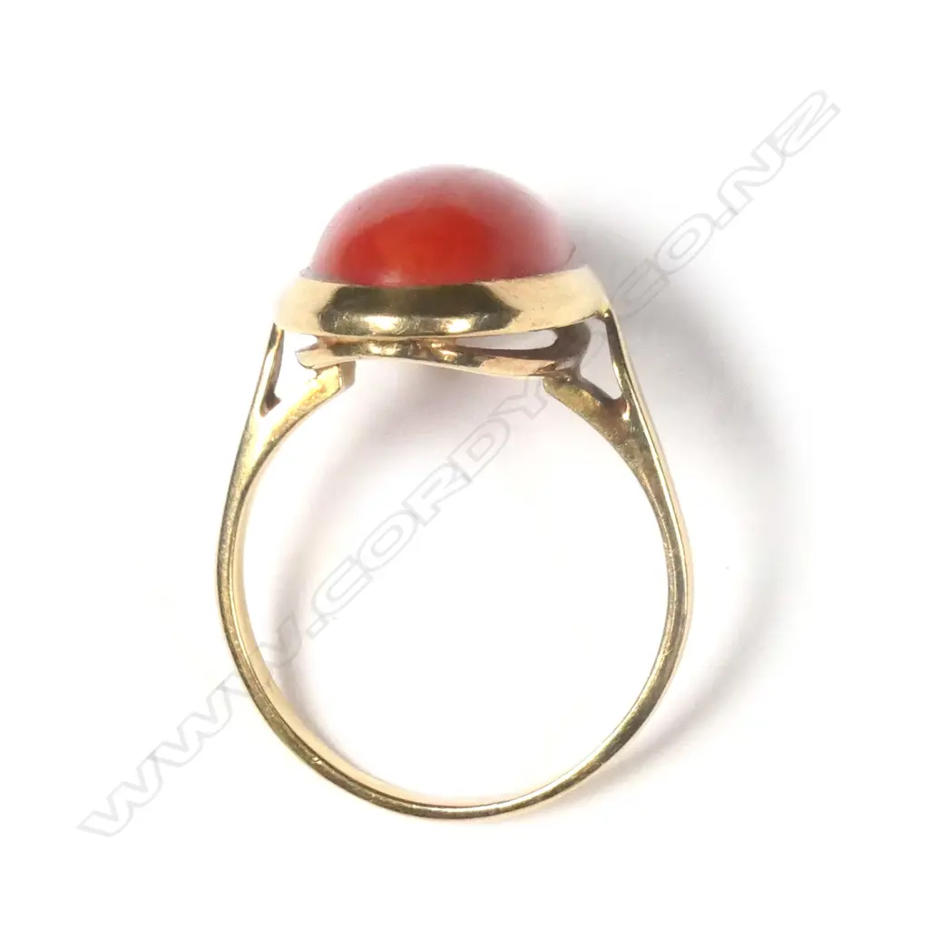 An 18ct. yellow gold and red coral dress ring Image 1++