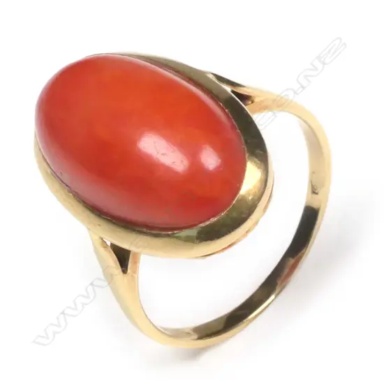 An 18ct. yellow gold and red coral dress ring