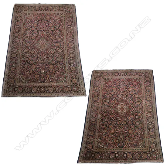 A pair of 1920s American Saruk hand knotted wool on cotton rugs