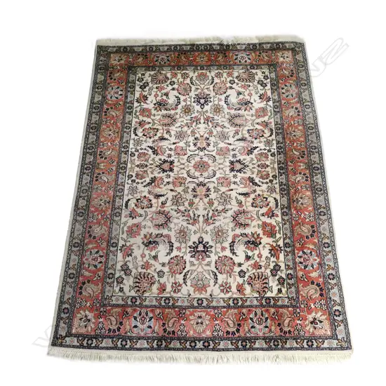 A Kashmir hand knotted silk-on-cotton rug