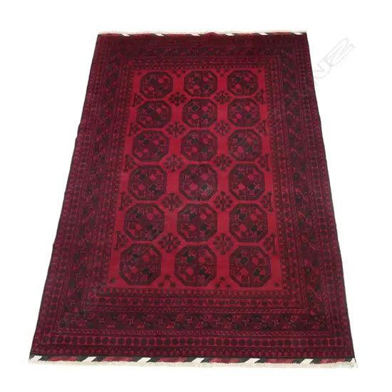 A large Turkman hand knotted carpet