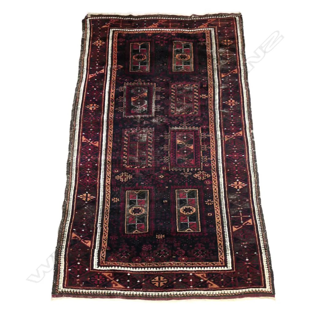 An antique Turkoman all wool rug Image 1++