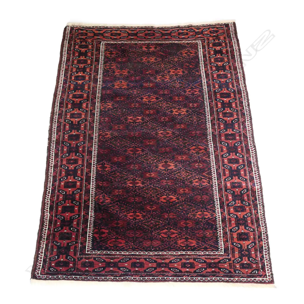 An antique Turkoman all wool rug Image 1++