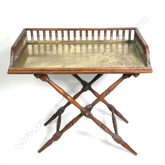 An unusual mahogany butler's tray top table