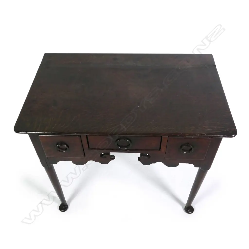 A George II oak lowboy Image 1++