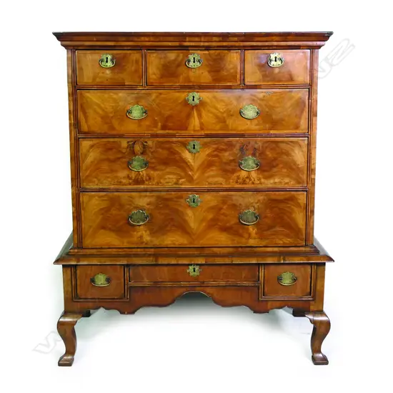 An early 18th century Georgian walnut chest on later stand