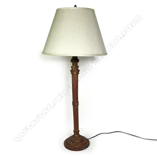 An antique style table lamp