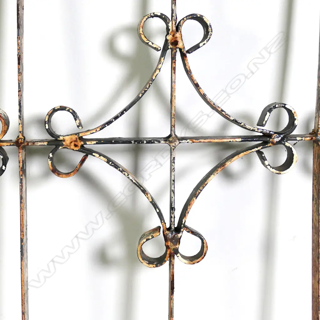 A pair of vintage wrought iron window grills Image 1++