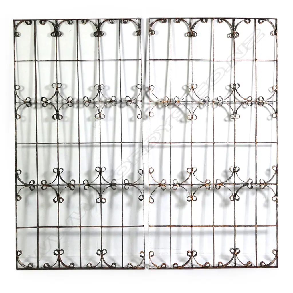 A pair of vintage wrought iron window grills Image 1++