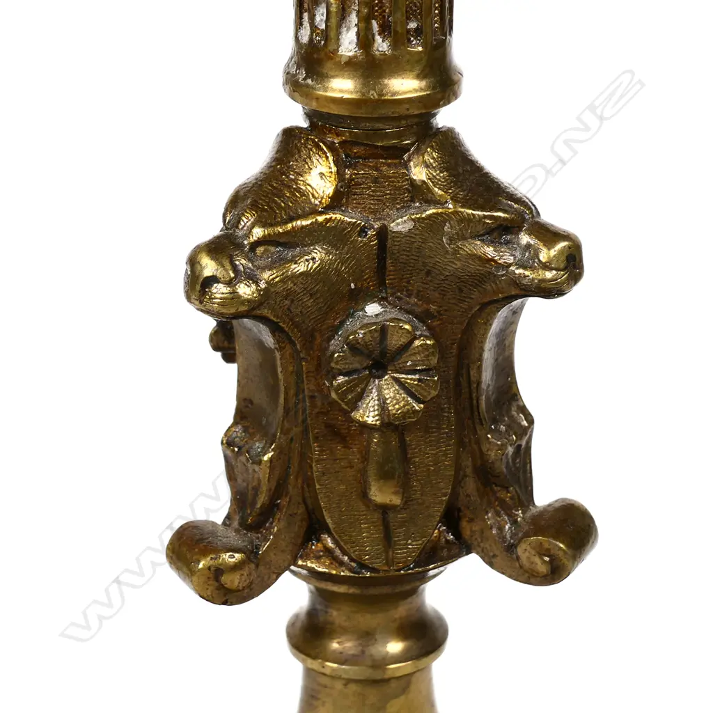 A pair of late Regency style brass candlesticks Image 1++