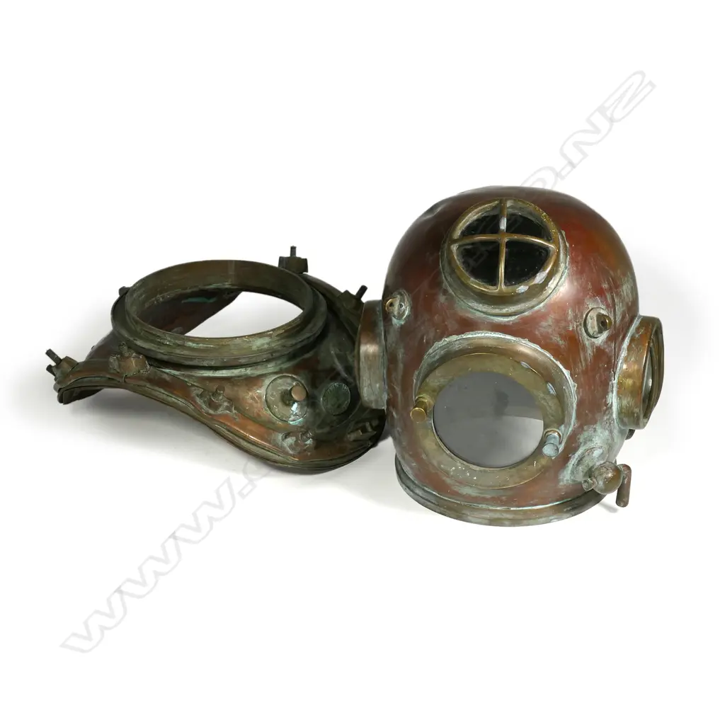 A vintage reproduction of a Siebe Gorman and Co. 12-bolt diving helmet Image 1++