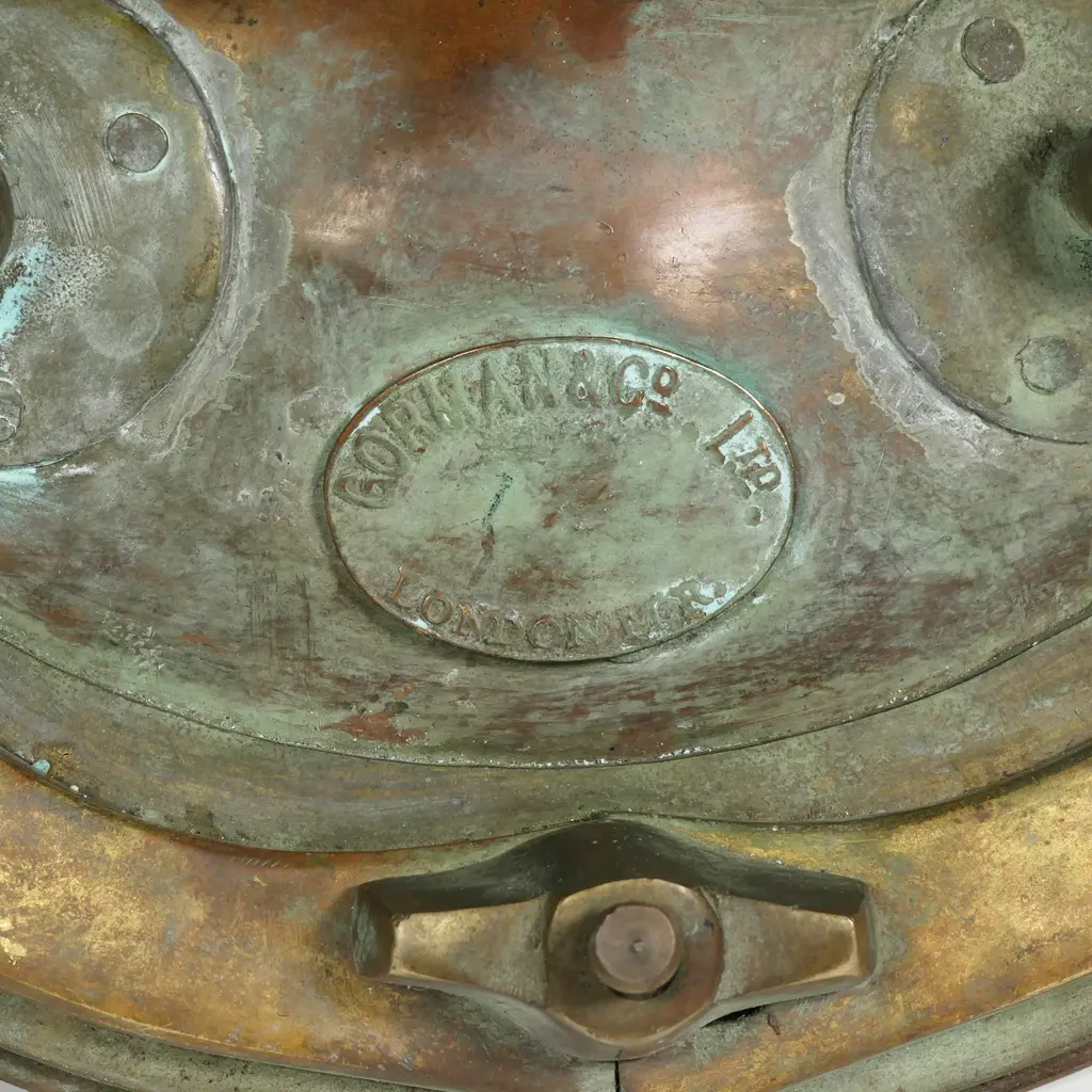 A vintage reproduction of a Siebe Gorman and Co. 12-bolt diving helmet Image 1++