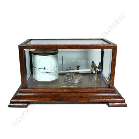 An early 20thC oak and glazed cased barograph