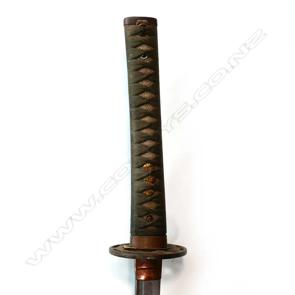 A Japanese early katana blade in mixed fittings including WW2 cloth and ray skin bound hilt Image 1++