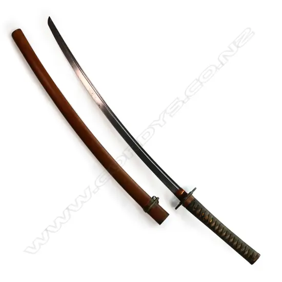 A Japanese early katana blade in mixed fittings including WW2 cloth and ray skin bound hilt